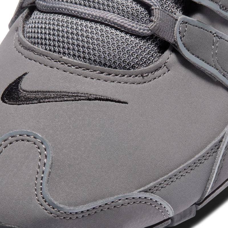 Men's dark gray mesh-and-suede lace-up sneaker upper with Nike swoosh and stitching