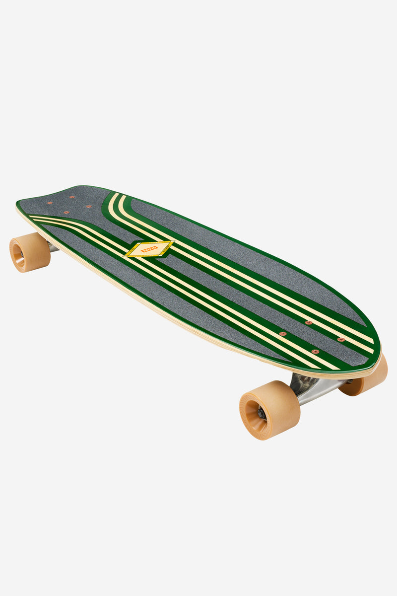 Angled side view of the Green Croc Cruiserboard with striped deck and tan wheels