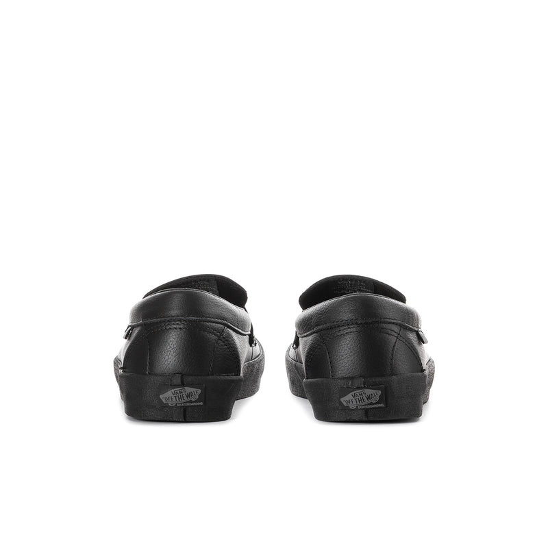 Men's black leather loafers, heel view with logo patch and side stitching