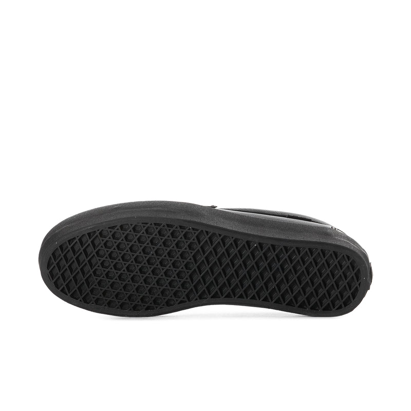 Black rubber outsole with textured grid tread