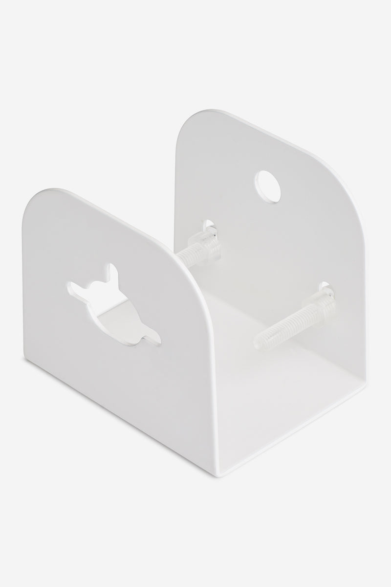 Close-up of white wall hanger bracket showing mounting bolts on a clean surface