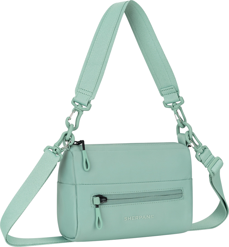 Quarter turn view Women's Sherpani Hand Bag style name Skye in color Surf. Sku: 26-SKYE004110
