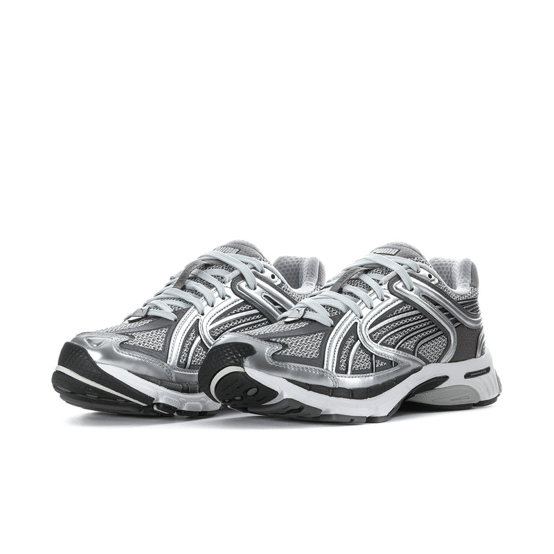 Women's PUMA running shoes, silver upper with black accents and white sole