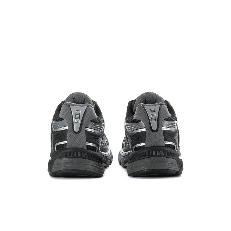 Women's black running shoes with cushioned heel and rear logo detail