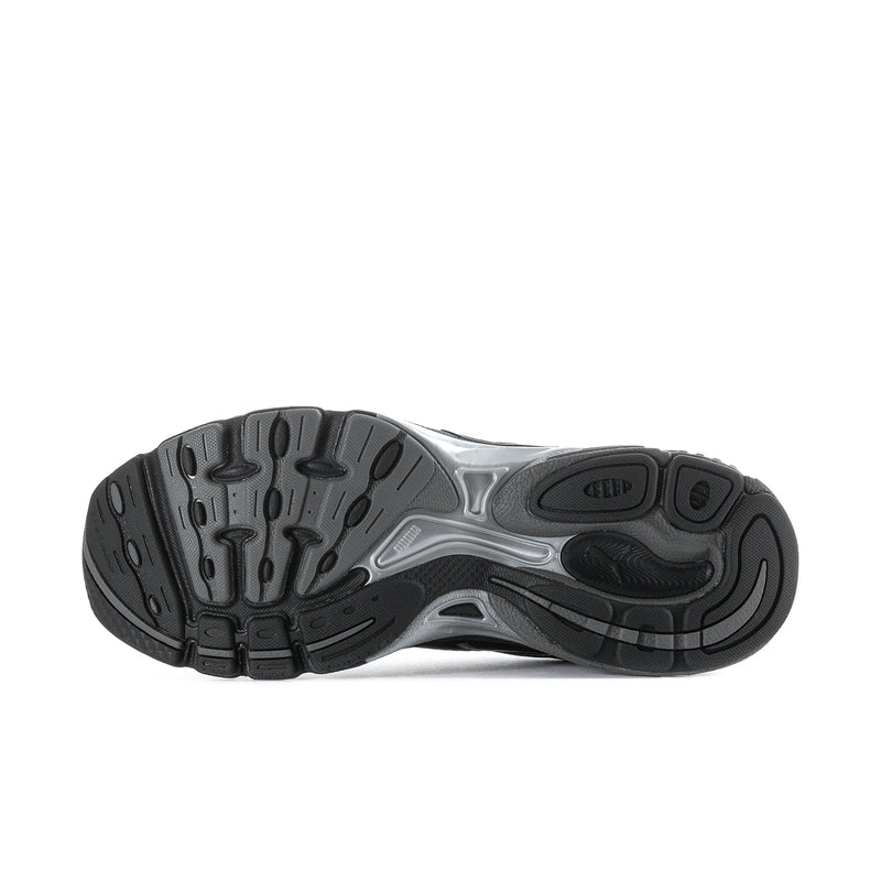 Women's black running shoe outsole with tread pattern and gray midfoot support