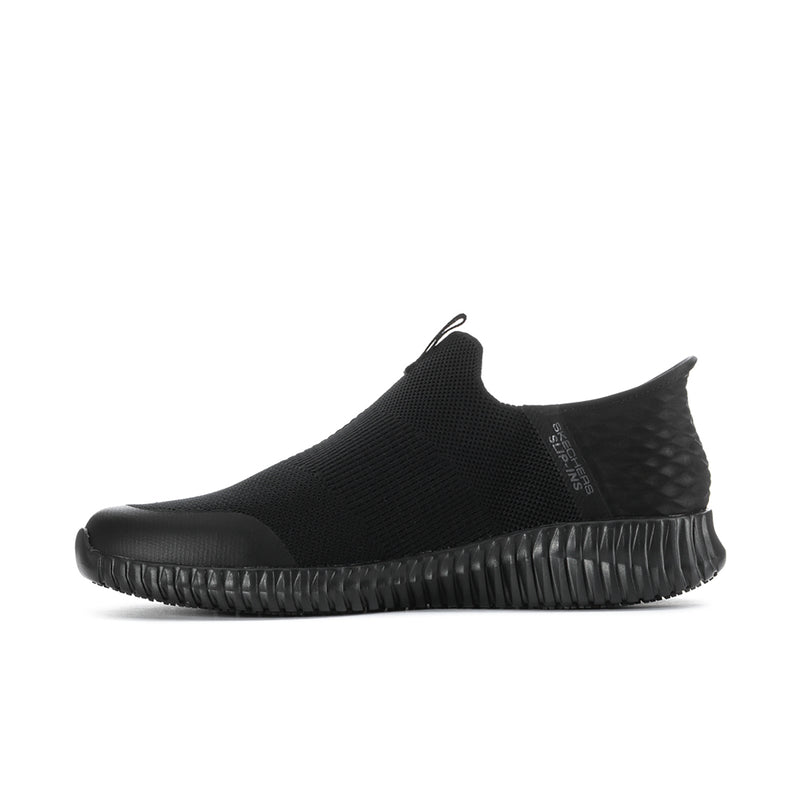 Black slip-on sneakers with low profile stretch upper and ribbed sidewall