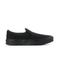 Men's black slip-on sneakers with low profile and textured rubber sole