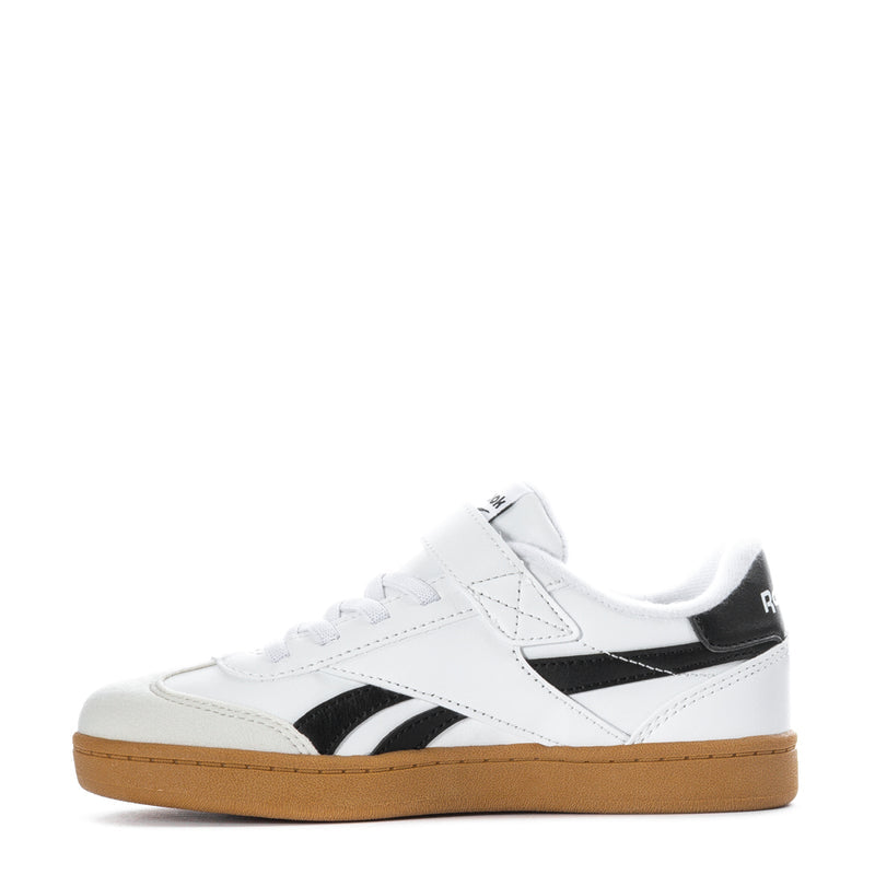 Kids white sneaker with black accents, hook-and-loop strap, and gum sole