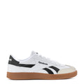 Mens white low-top sneakers with black stripes and gum rubber sole