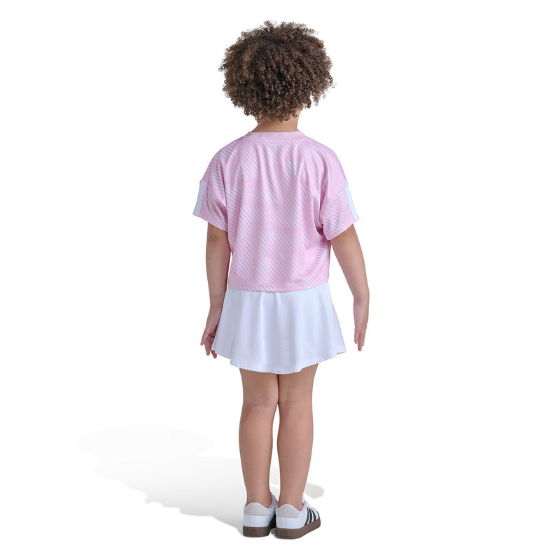 Kids pink striped jersey top and white skort, back view