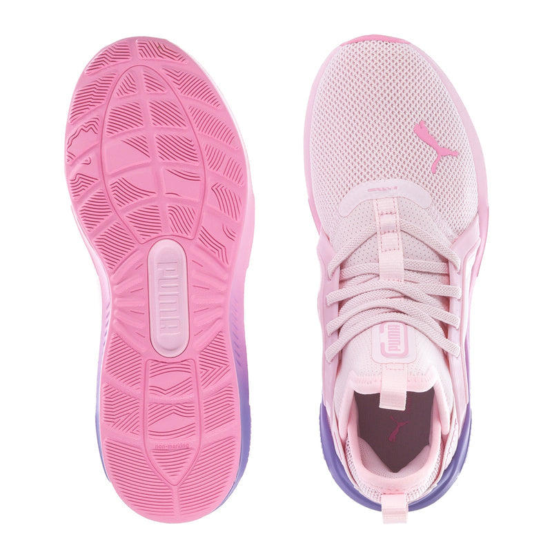 Kids sneakers shown from outsole and interior, pink with lace-up tongue