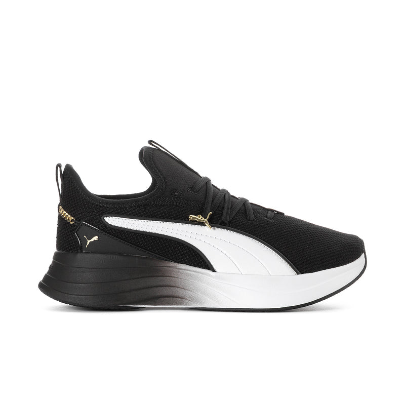 Black and white women's running sneakers with gold logo and white midsole