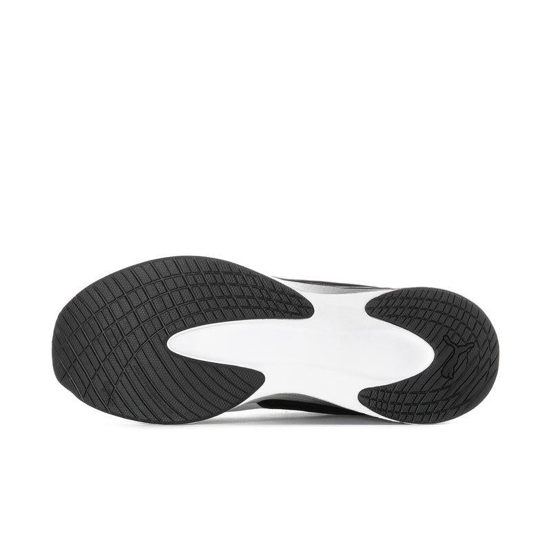 Black textured sneaker outsole with tread pattern and white midfoot panel