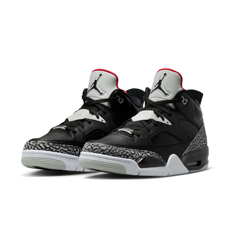 Pair of black low-top sneakers with elephant-print panels and red-trimmed collars