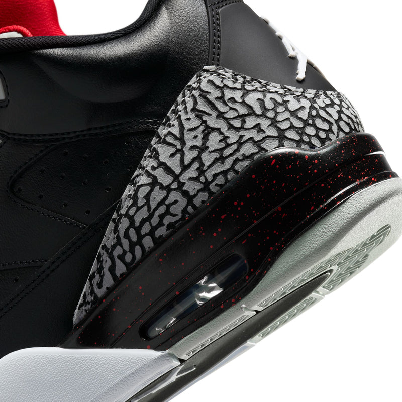 Close-up of black side panel with elephant-print overlay and visible air unit details