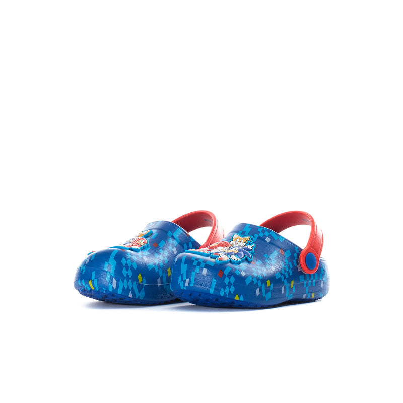 Toddler slip-on clogs, blue with pixel pattern and red accents; side view