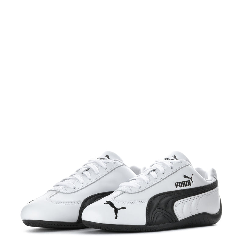White and black women's leather sneakers, lace-up with Puma side and heel logos
