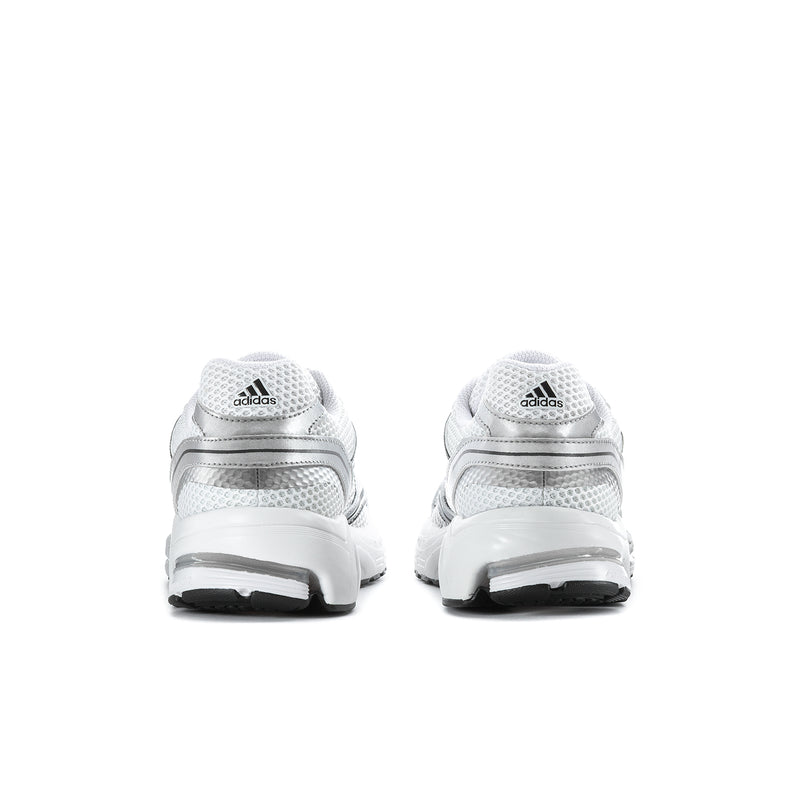 Men's sneakers heel view with white back panels and cushioned midsole.