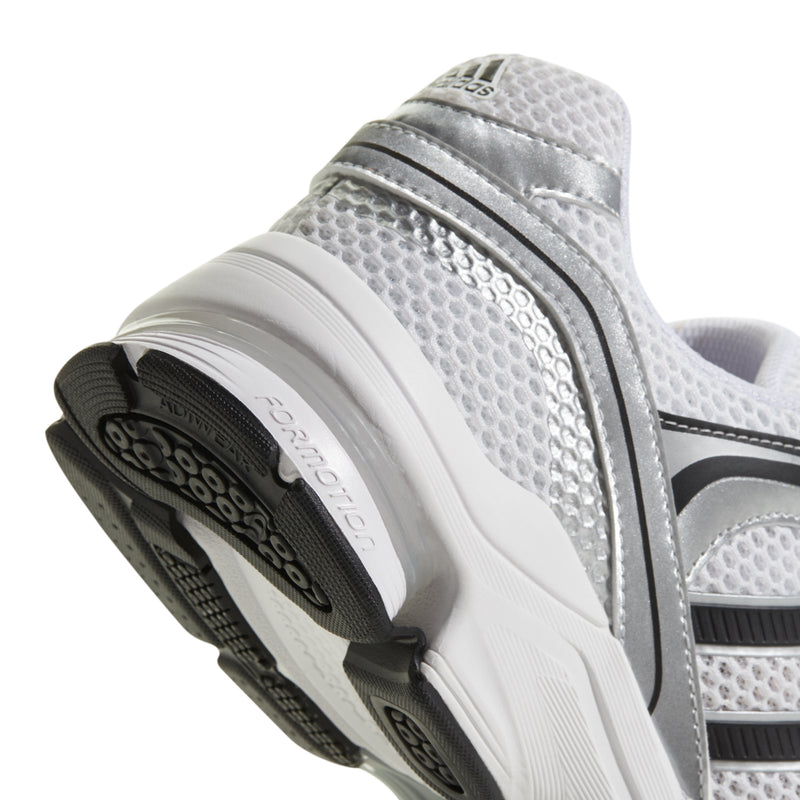 Close-up of men's sneaker heel, white mesh with padded collar and tread.