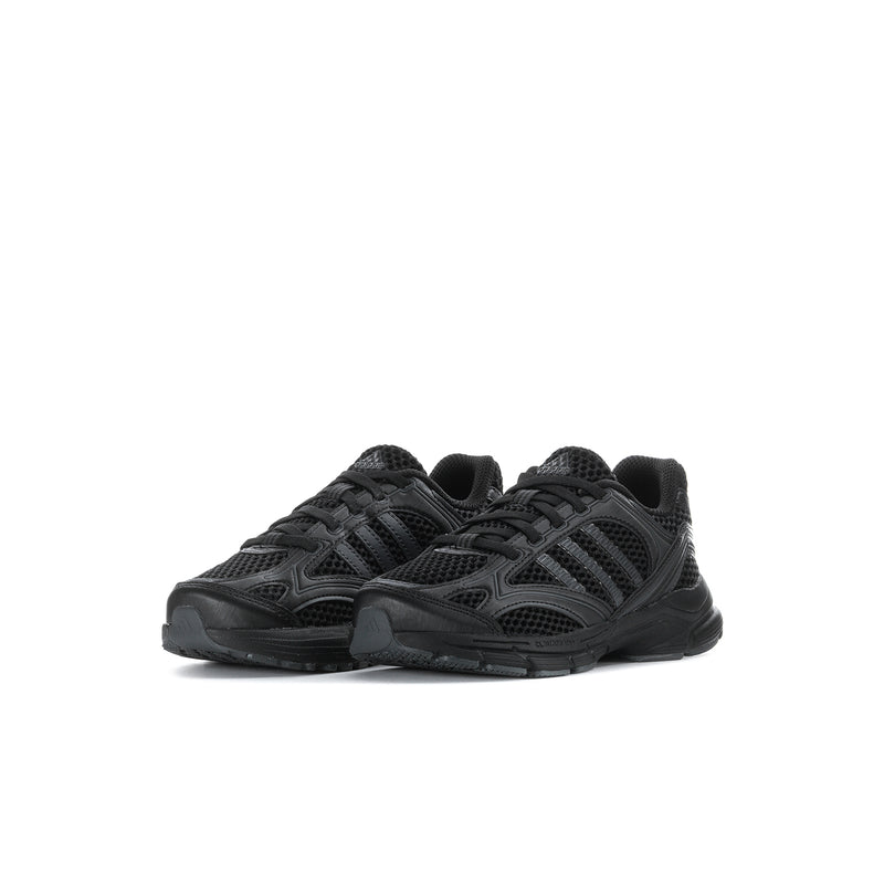 Kids black lace-up sneakers, side view with textured panels