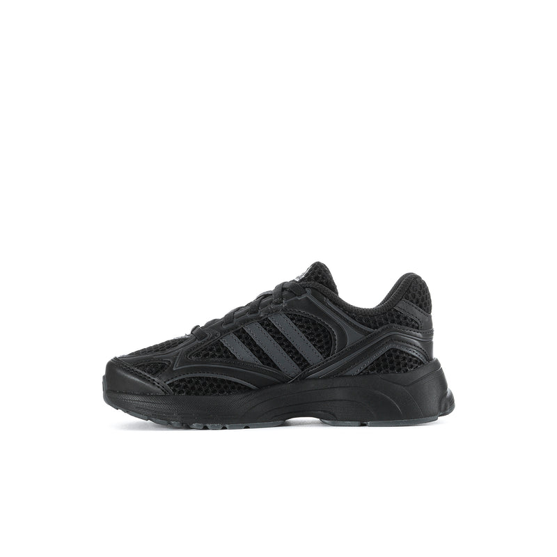 Kids black sneakers angled side view with three stripe detail