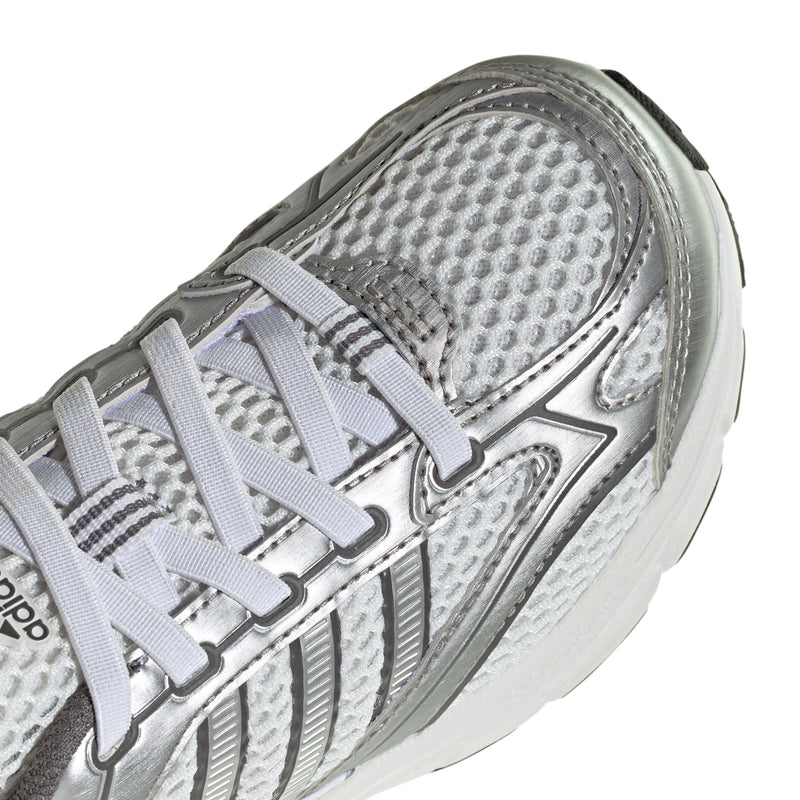 Grey kids sneaker upper close-up with mesh texture, lace straps, and stitched detailing