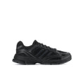 Youth black running sneakers with mesh upper and lace-up design