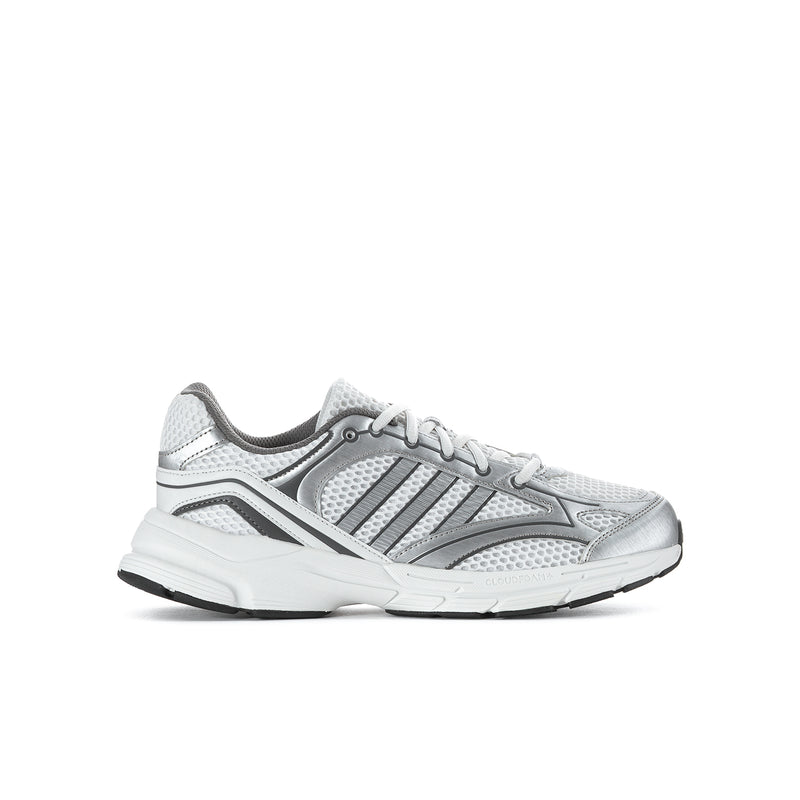 Youth running shoes in light grey and white with lace-up front and sporty stripes