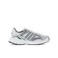 Youth running shoes in light grey and white with lace-up front and sporty stripes