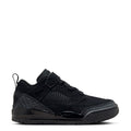 Kids black low-top sneakers with hook-and-loop strap and mesh paneling