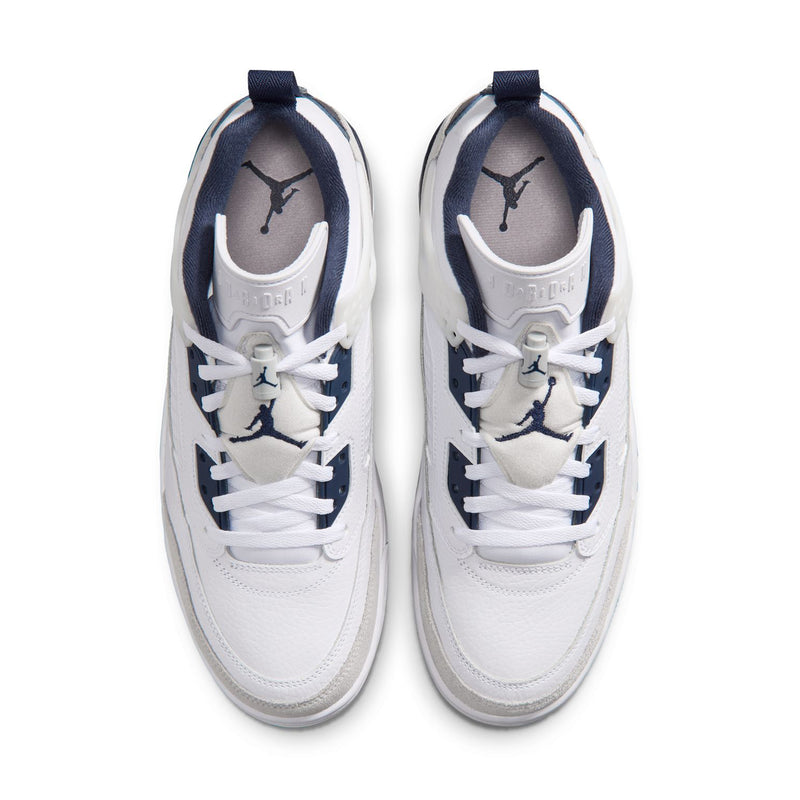Men's low-top sneakers, white laced front view with navy interior accents