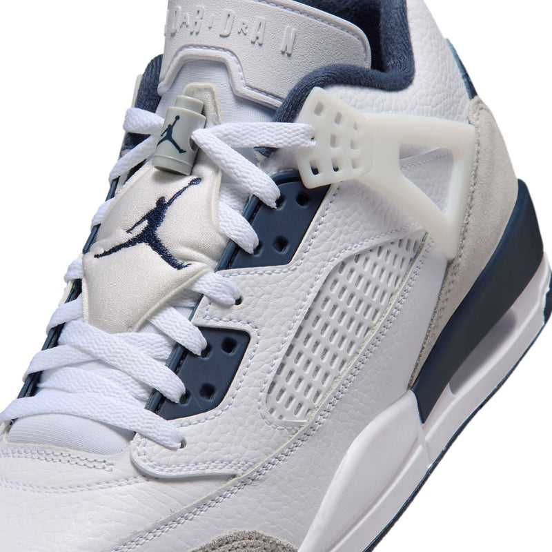 Men's low-top sneakers close-up of laces and tongue with Jumpman logo