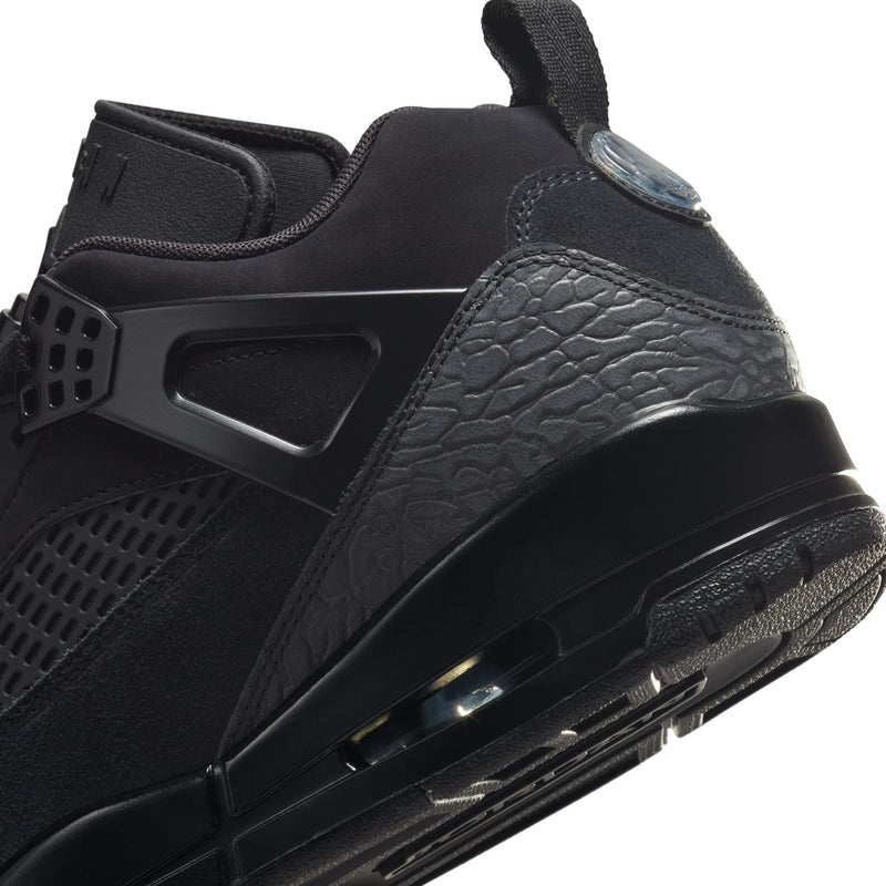 Black sneaker side with textured overlay and visible air unit window at midsole