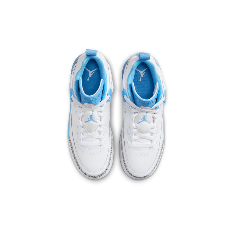 Youth low-top sneakers with white uppers and bright blue interior lining