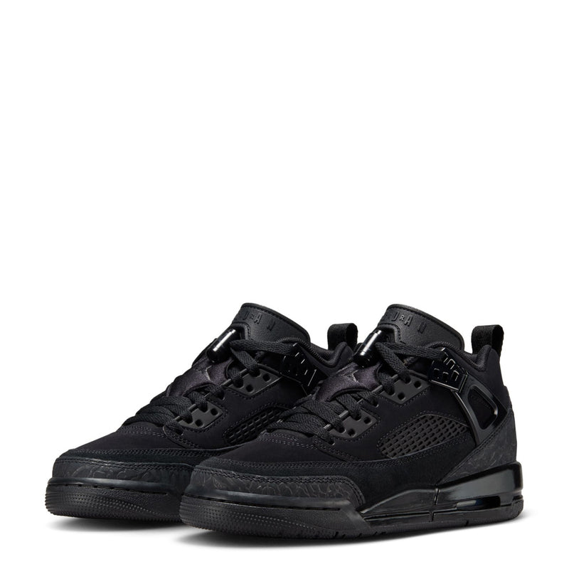 Youth low-top sneakers, black pair shown from side and front with lace-up straps