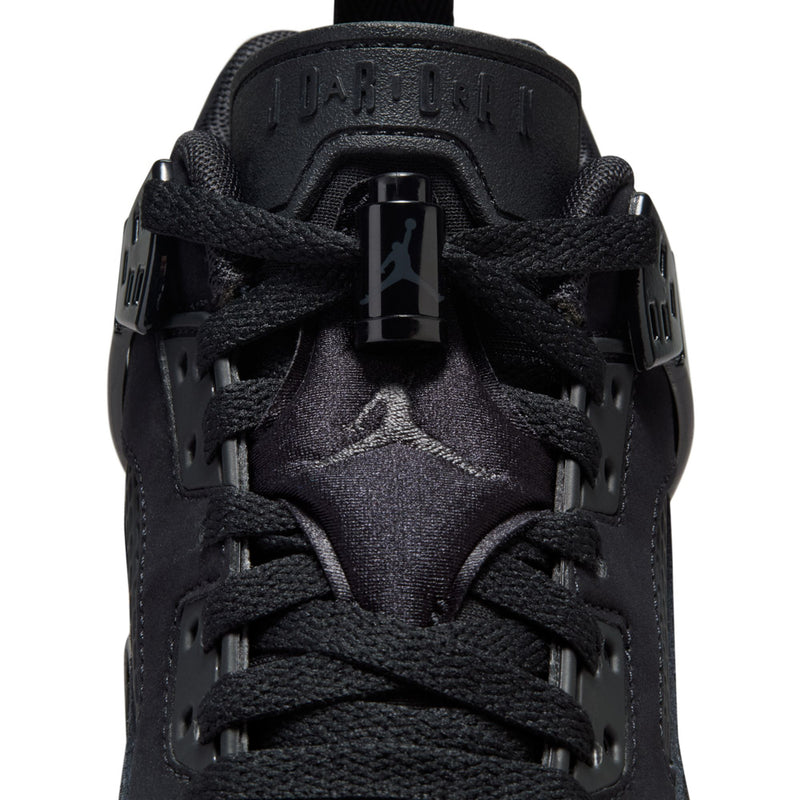 Black youth sneaker front with lace-up, tongue logo, and front strap details