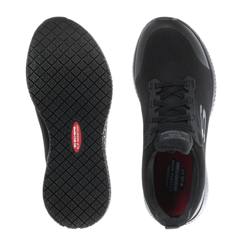 Women’s black athletic sneaker with patterned rubber outsole and laces