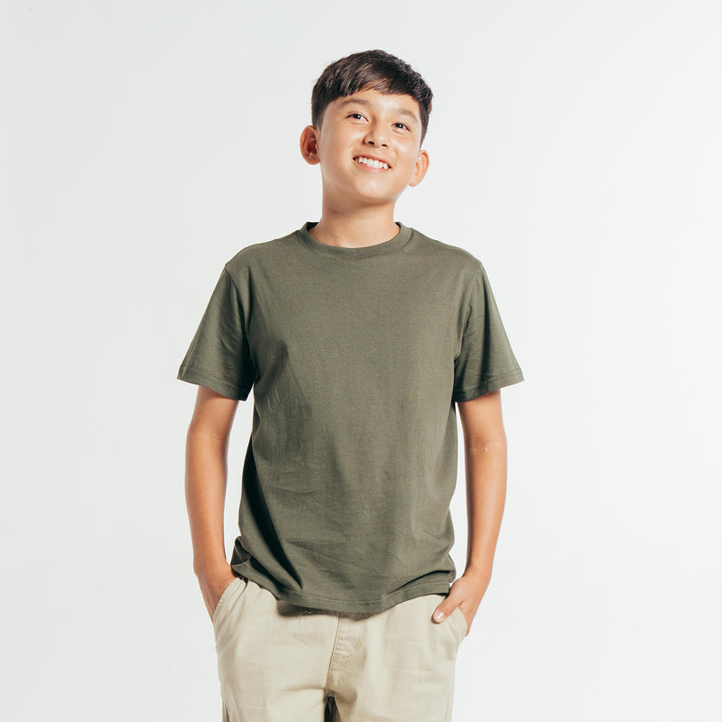 Youth crew T-shirt in dark forest green on boy, short sleeves and crew neck