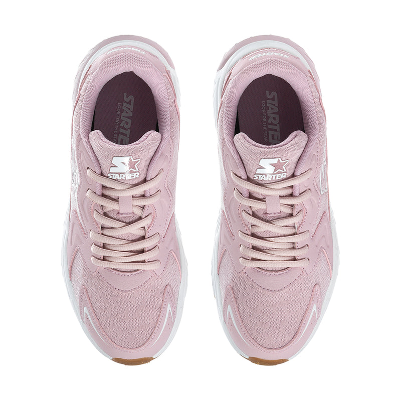Women's pale lilac sneakers showing tongue label, lace eyelets and white sole