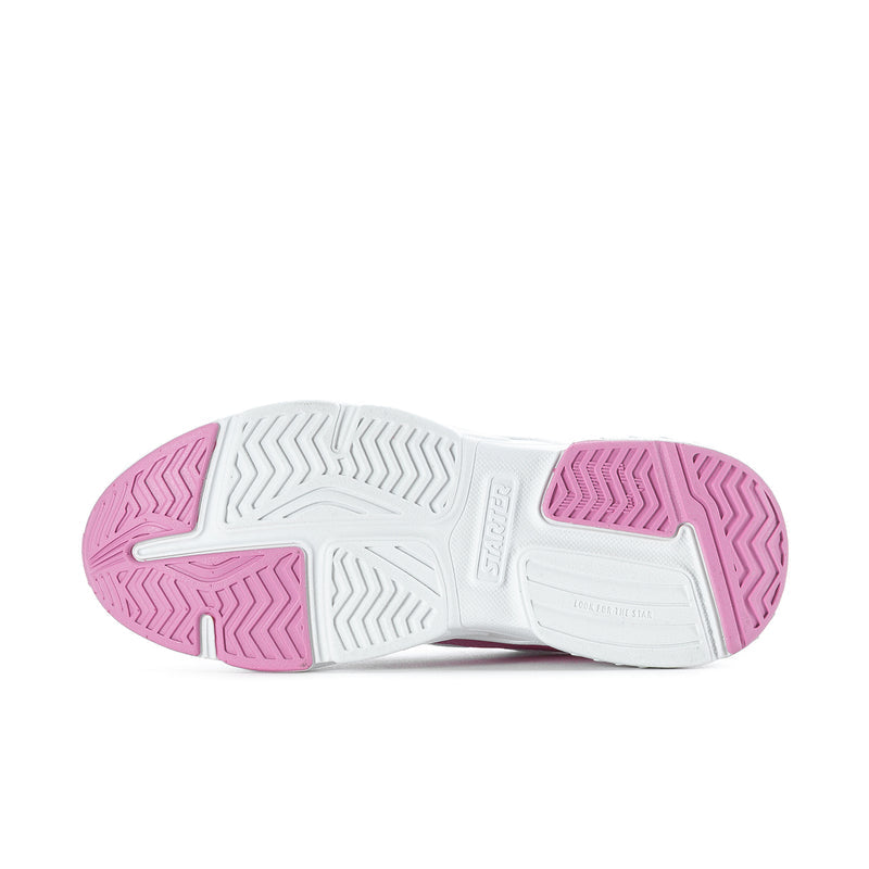 White sneaker outsole with pink tread blocks for traction
