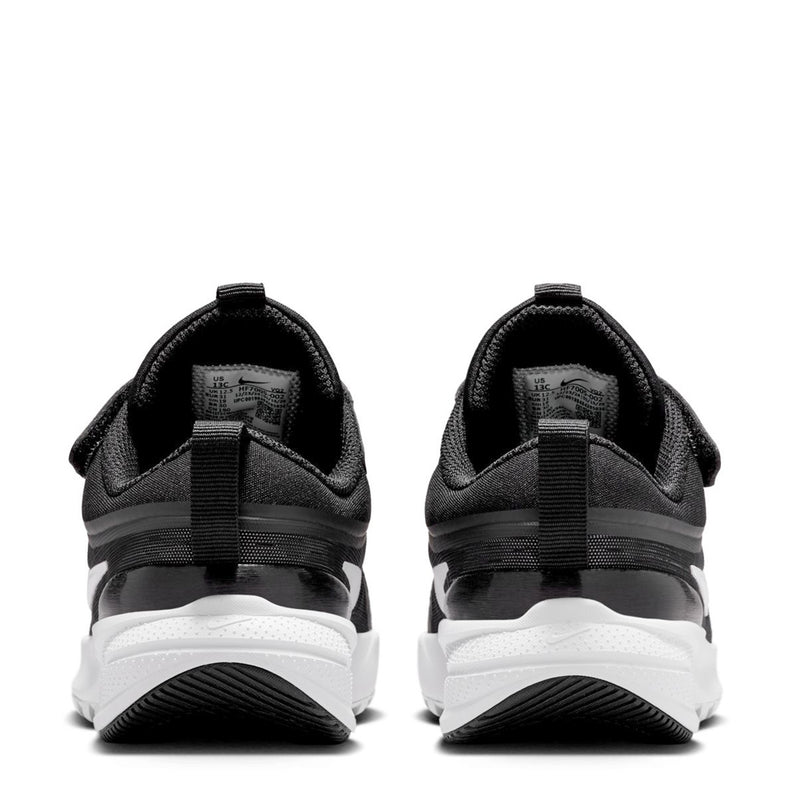 Kids black sneaker heel view with cushioned white sole and hook-and-loop strap