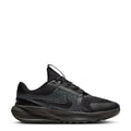 Youth running shoe in black and dark anthracite, with lace-up front and cushioned sole