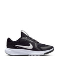 Youth black running sneaker with white Nike swoosh and cushioned sole