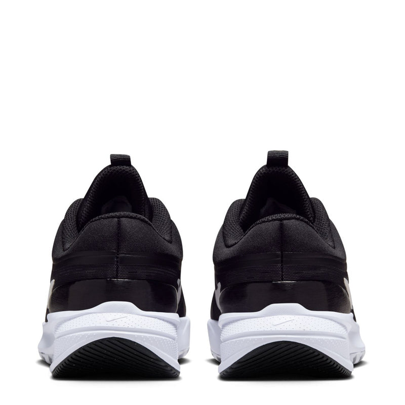 Youth black sneaker heel view with white midsole and lace stays