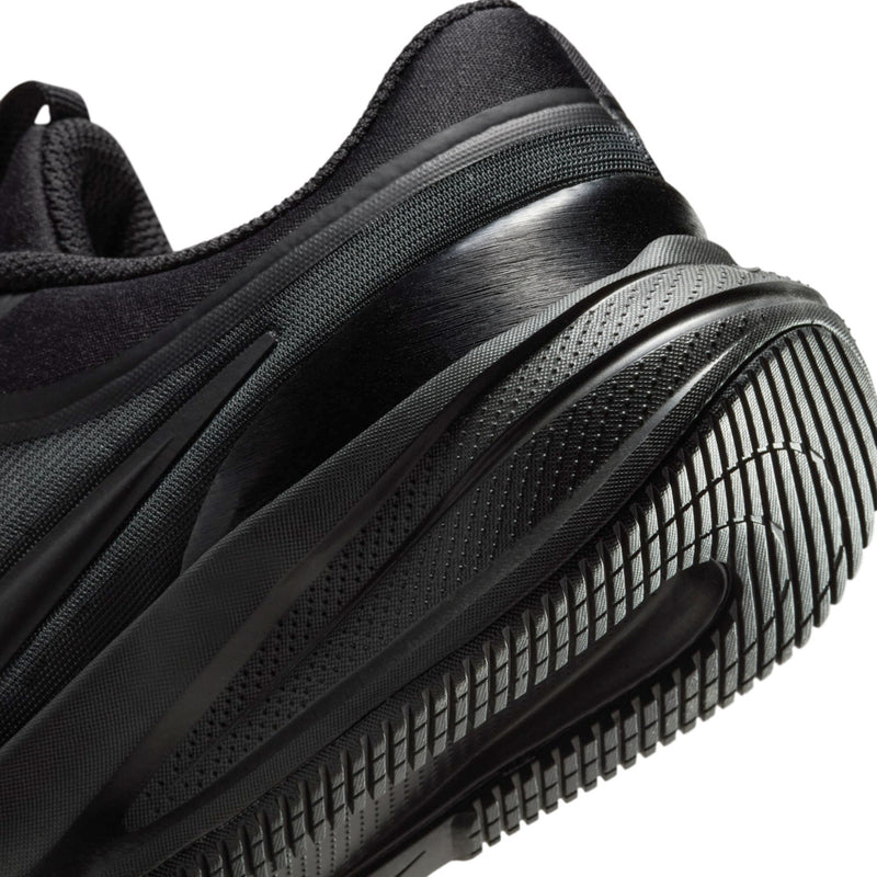 Youth running shoe close-up of side midsole with molded traction grooves
