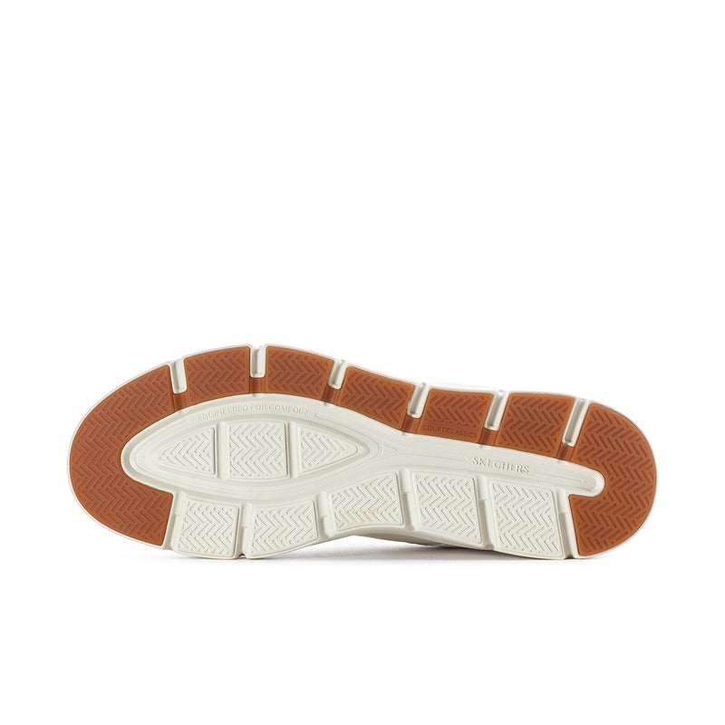 Textured rubber outsole with brown traction sections