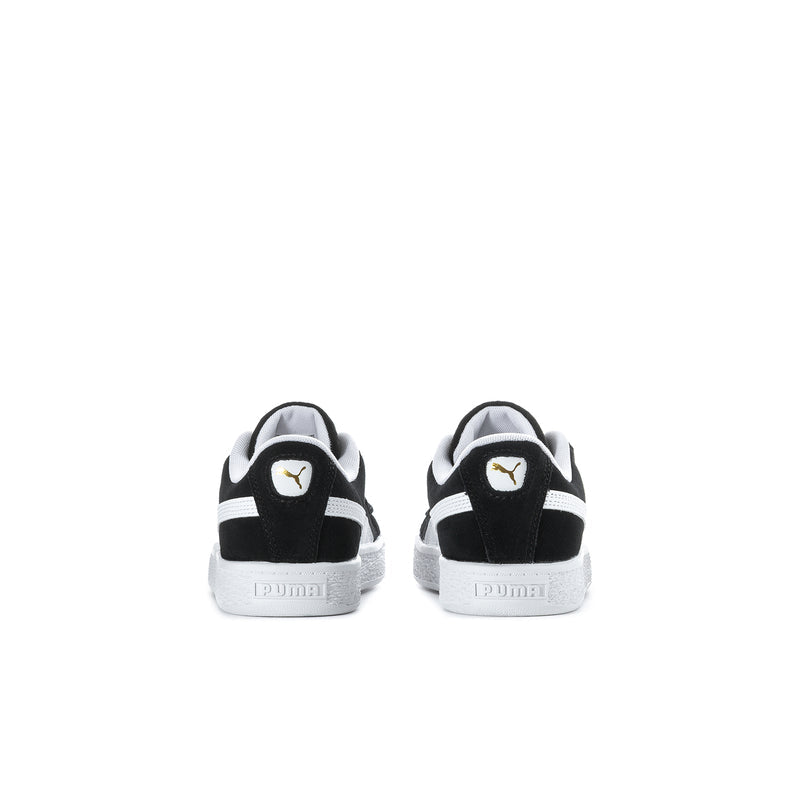 Kids black suede sneakers with white heel stripe and PUMA cat on back.