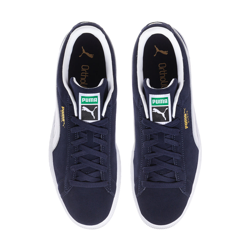 Navy suede lace-up sneakers with white Puma logo on tongue and white interior lining