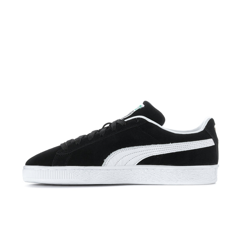 Black suede low-top sneakers with white stripe and textured toe panel