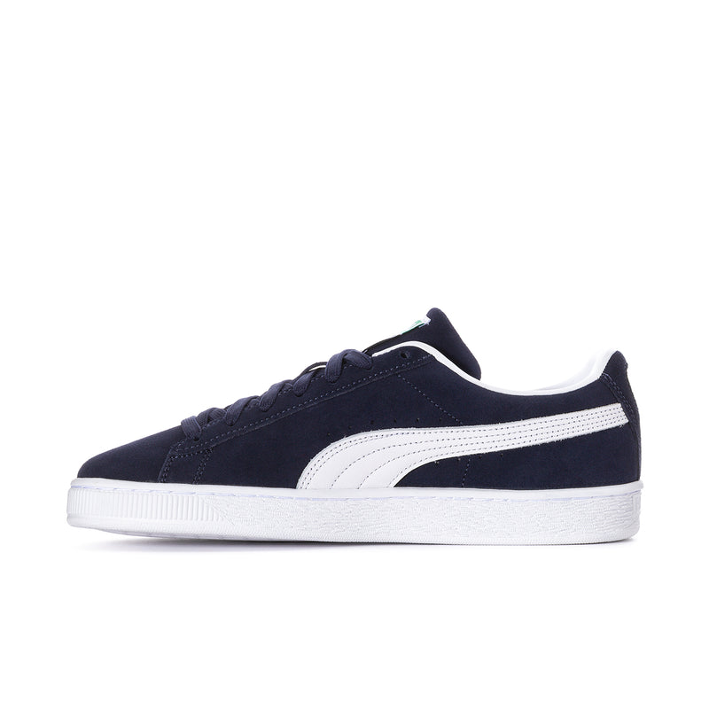 Navy suede low-top sneaker with white side stripe and white rubber sole